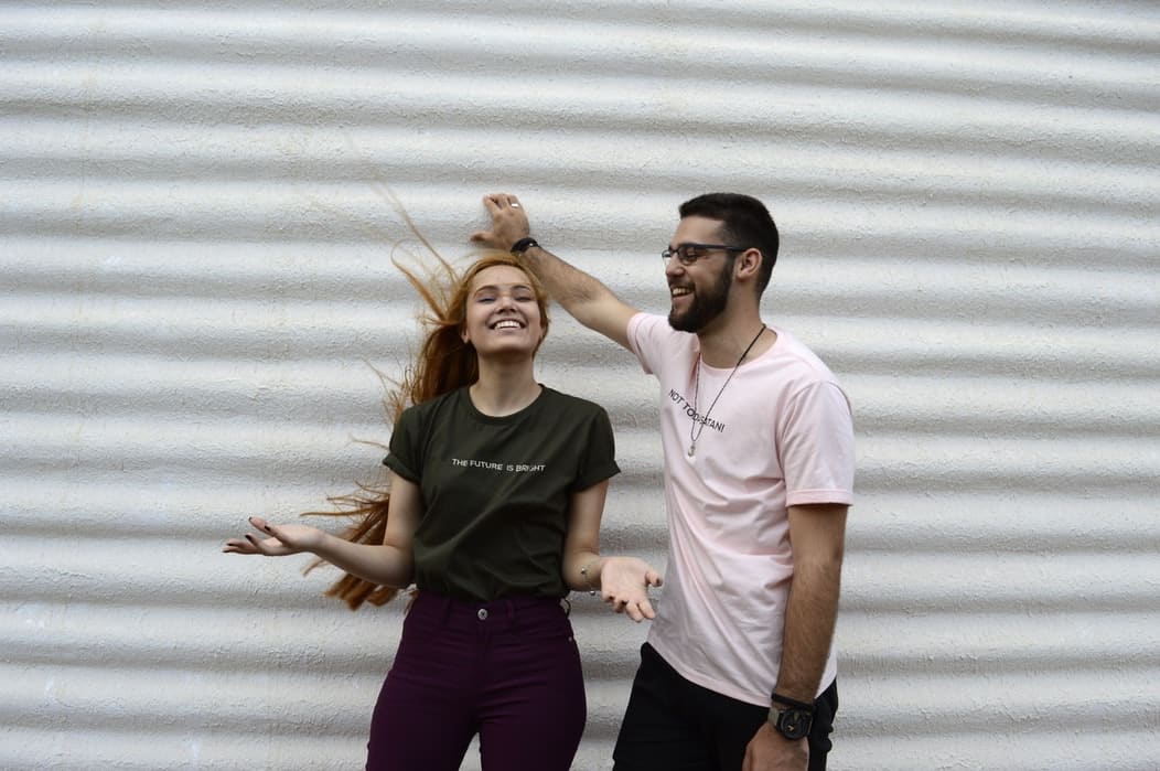 Girl and boy smiling