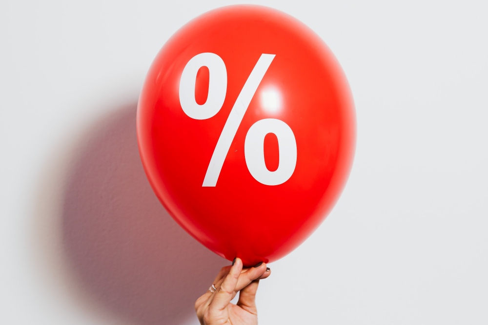 Red balloon with percent symbol