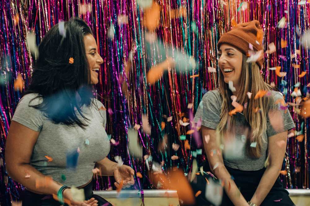 Girls celebrating with confetti